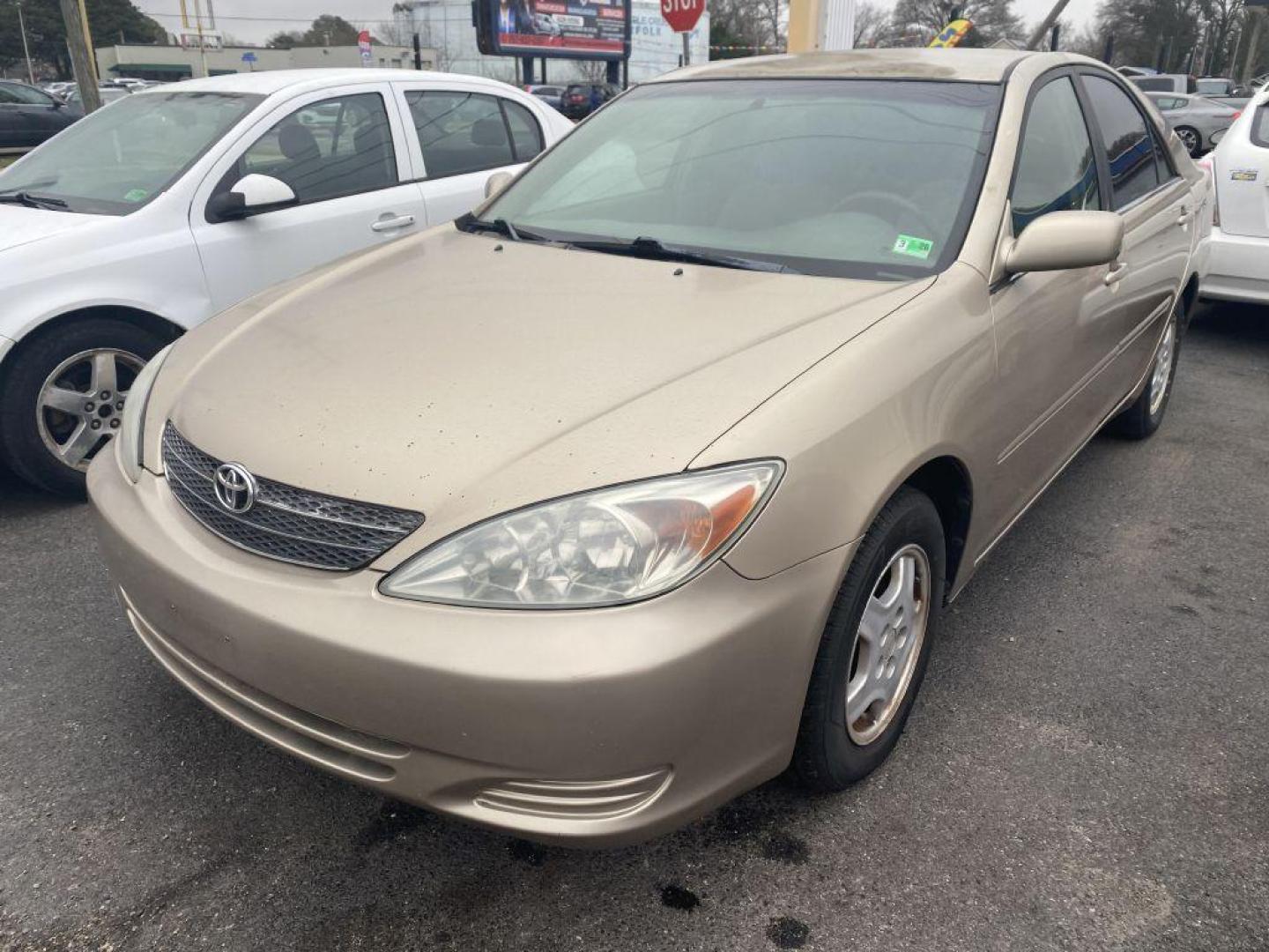 2003 GOLD TOYOTA CAMRY LE (4T1BF32K93U) with an 3.0L engine, Automatic transmission, located at 930 E Little Creek Road, Norfolk, VA, 23518, (757) 588-0420, 36.915051, -76.244408 - Photo#0