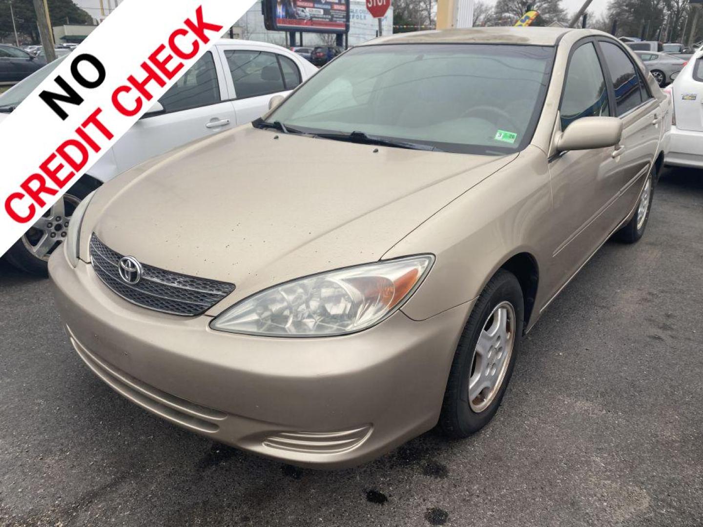 2003 GOLD TOYOTA CAMRY LE (4T1BF32K93U) with an 3.0L engine, Automatic transmission, located at 930 E Little Creek Road, Norfolk, VA, 23518, (757) 588-0420, 36.915051, -76.244408 - Photo#0