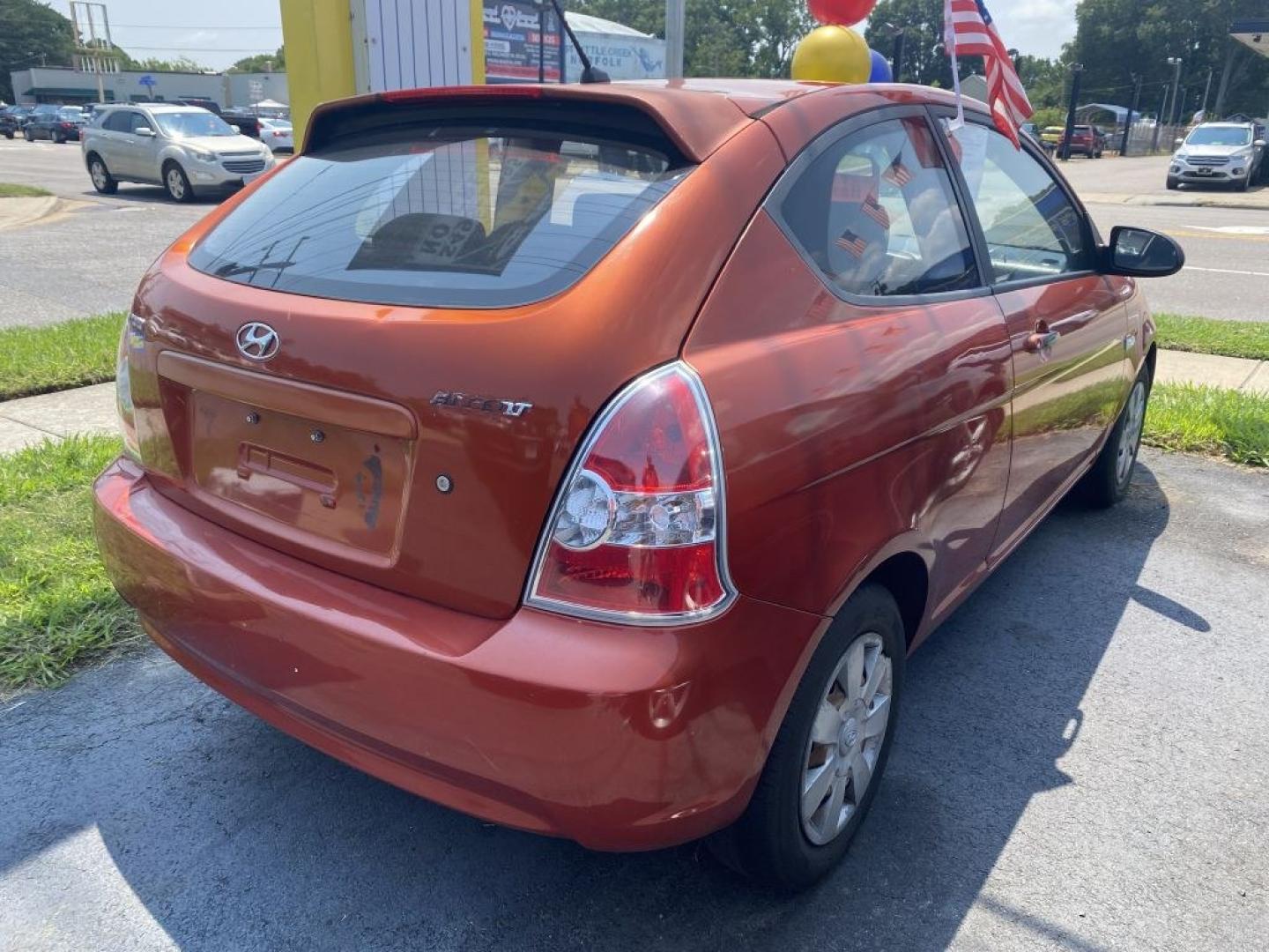 2007 ORANGE HYUNDAI ACCENT GS (KMHCM36C07U) with an 1.6L engine, 4-Speed Manual transmission, located at 930 E Little Creek Road, Norfolk, VA, 23518, (757) 588-0420, 36.915051, -76.244408- Photo#1