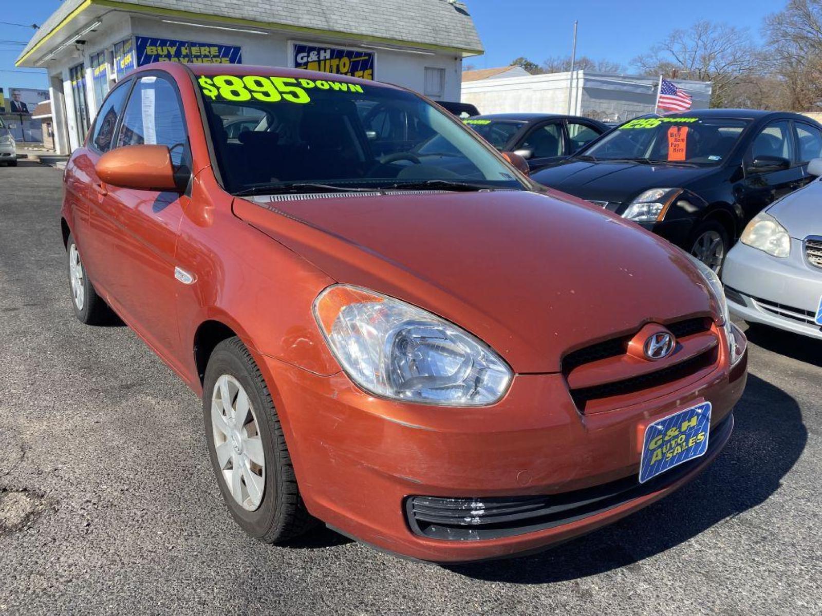 2007 ORANGE HYUNDAI ACCENT GS (KMHCM36C07U) with an 1.6L engine, 4-Speed Manual transmission, located at 930 E Little Creek Road, Norfolk, VA, 23518, (757) 588-0420, 36.915051, -76.244408 - Photo #0