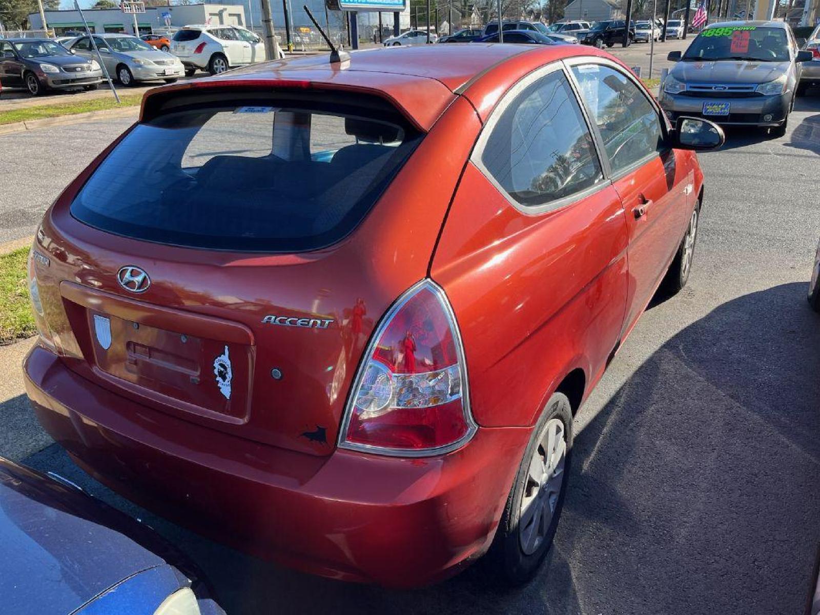 2007 ORANGE HYUNDAI ACCENT GS (KMHCM36C07U) with an 1.6L engine, 4-Speed Manual transmission, located at 930 E Little Creek Road, Norfolk, VA, 23518, (757) 588-0420, 36.915051, -76.244408 - Photo #4