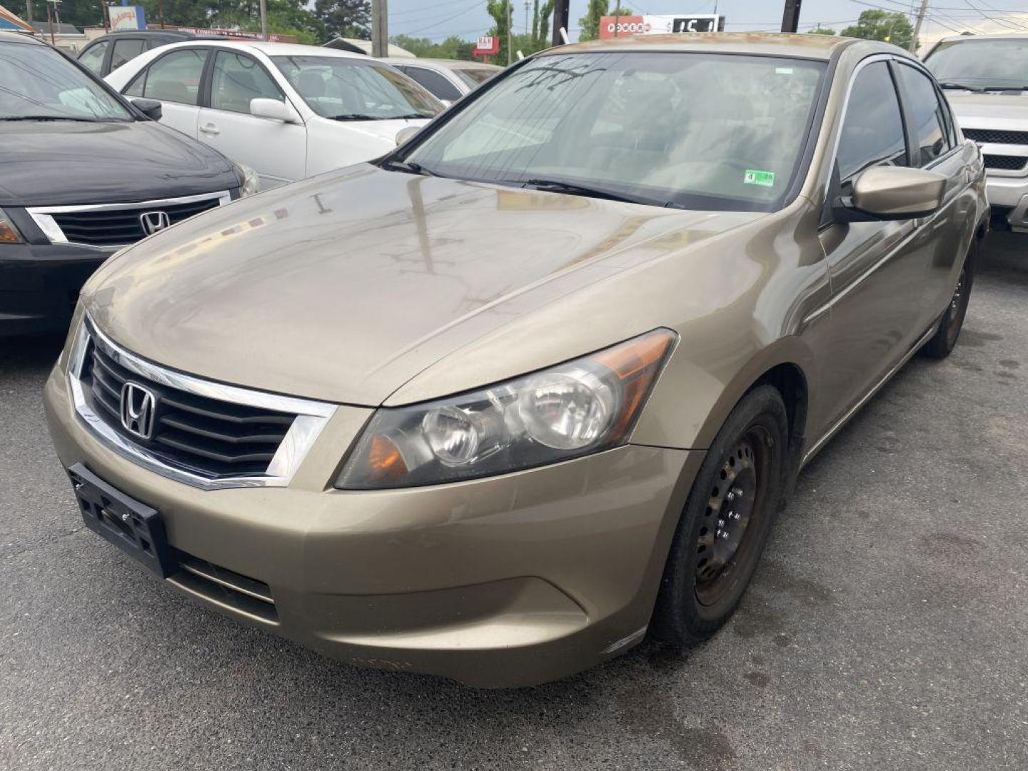 2009 GOLD HONDA ACCORD LX (JHMCP26369C) with an 2.4L engine, Automatic transmission, located at 930 E Little Creek Road, Norfolk, VA, 23518, (757) 588-0420, 36.915051, -76.244408 - Photo#0