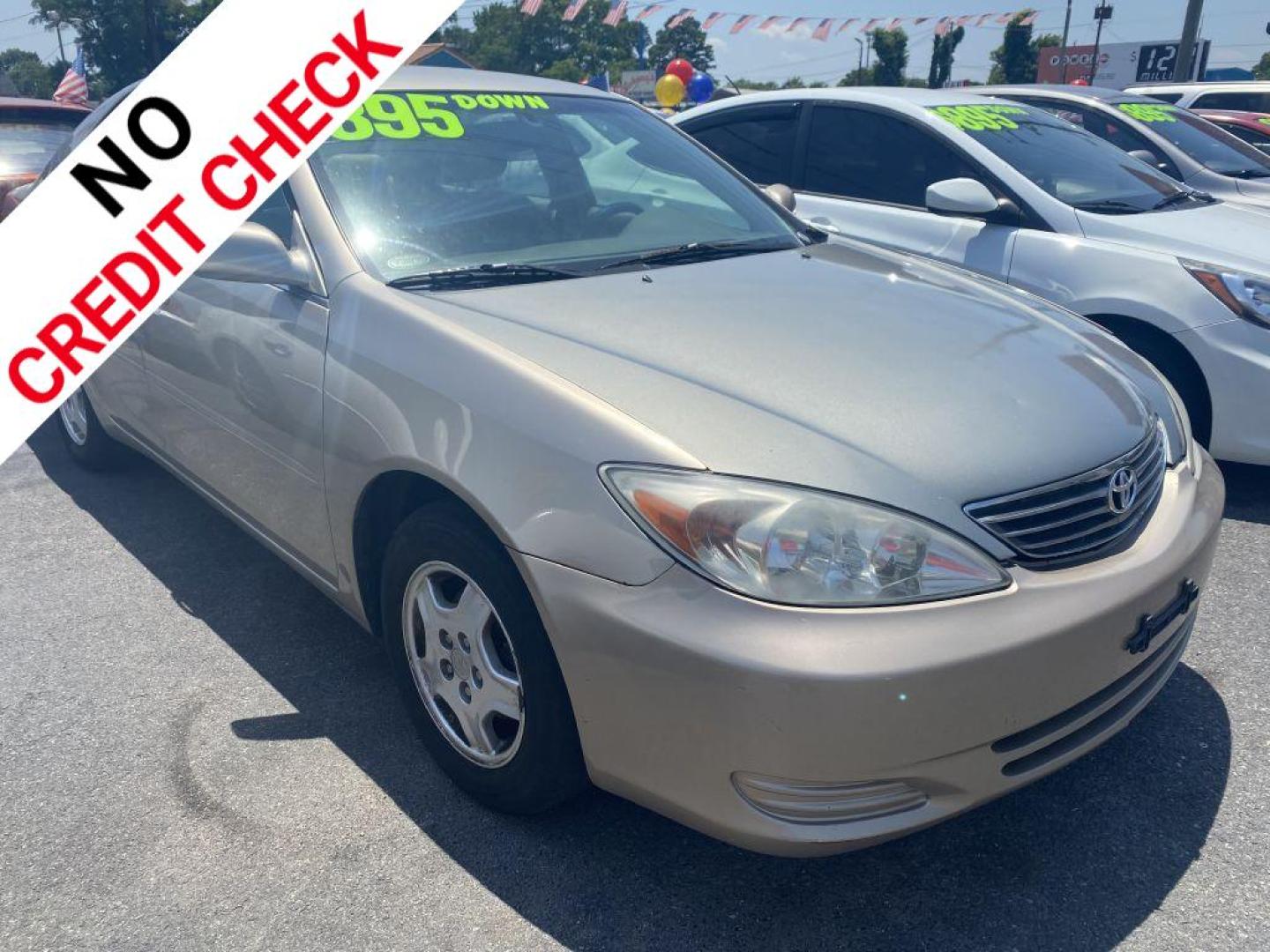 2002 GOLD TOYOTA CAMRY LE (4T1BF32K12U) with an 3.0L engine, Automatic transmission, located at 930 E Little Creek Road, Norfolk, VA, 23518, (757) 588-0420, 36.915051, -76.244408 - Photo#0