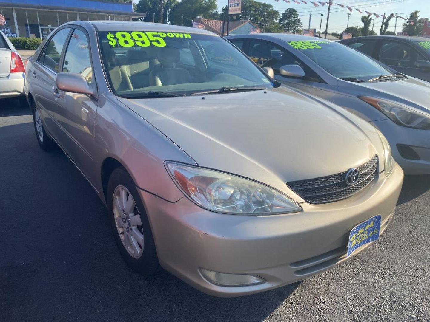 2004 GOLD TOYOTA CAMRY LE (4T1BE30K94U) with an 2.4L engine, Automatic transmission, located at 930 E Little Creek Road, Norfolk, VA, 23518, (757) 588-0420, 36.915051, -76.244408 - Photo#0