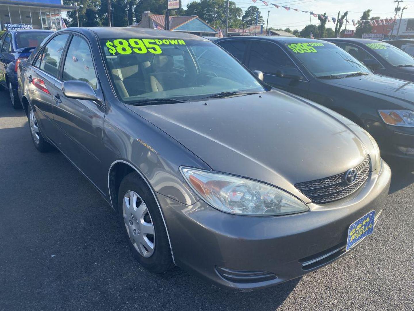 2004 GRAY TOYOTA CAMRY LE (JTDBE32K740) with an 2.4L engine, Automatic transmission, located at 930 E Little Creek Road, Norfolk, VA, 23518, (757) 588-0420, 36.915051, -76.244408 - Photo#0