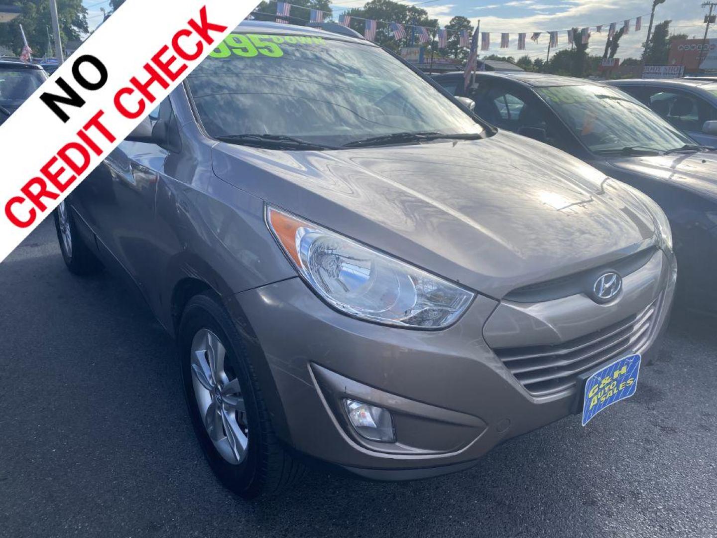 2013 BROWN HYUNDAI TUCSON GLS (KM8JU3AC1DU) with an 2.4L engine, Automatic transmission, located at 930 E Little Creek Road, Norfolk, VA, 23518, (757) 588-0420, 36.915051, -76.244408 - Photo#0