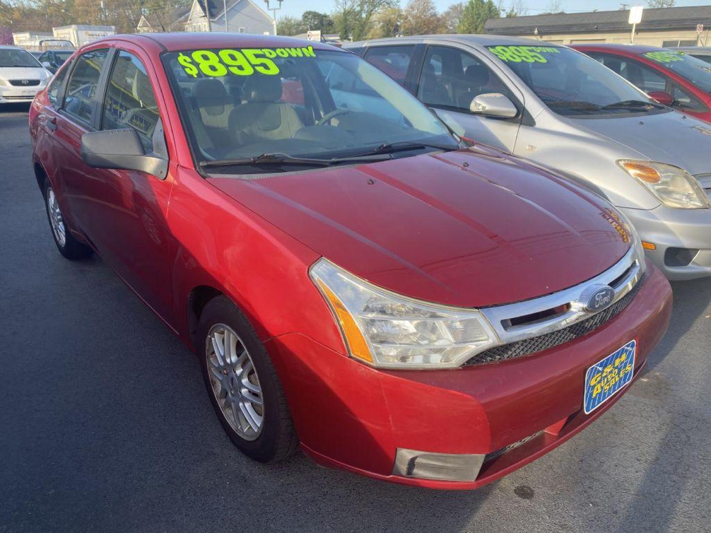 2009 RED FORD FOCUS SE (1FAHP35N29W) with an 2.0L engine, Automatic transmission, located at 930 E Little Creek Road, Norfolk, VA, 23518, (757) 588-0420, 36.915051, -76.244408 - Photo#0