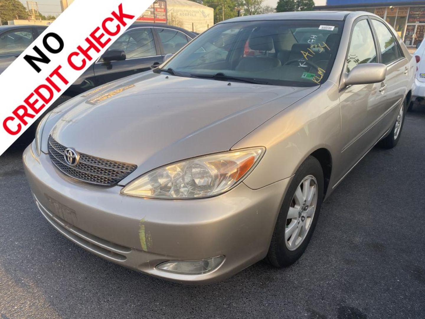 2004 GOLD TOYOTA CAMRY LE (4T1BF30K24U) with an 3.0L engine, Automatic transmission, located at 930 E Little Creek Road, Norfolk, VA, 23518, (757) 588-0420, 36.915051, -76.244408 - Photo#0