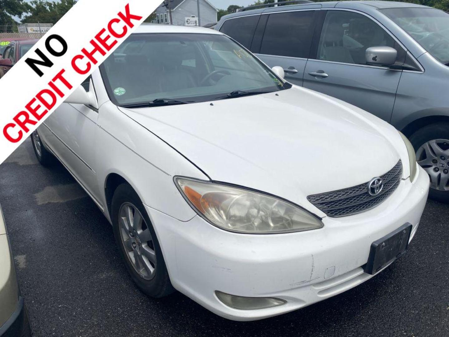 2004 WHITE TOYOTA CAMRY LE (JTDBF30K040) with an 3.0L engine, Automatic transmission, located at 930 E Little Creek Road, Norfolk, VA, 23518, (757) 588-0420, 36.915051, -76.244408 - Photo#0