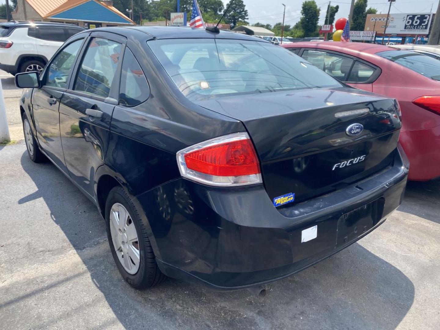 2009 BLACK FORD FOCUS S (1FAHP34N99W) with an 2.0L engine, Automatic transmission, located at 930 E Little Creek Road, Norfolk, VA, 23518, (757) 588-0420, 36.915051, -76.244408- Photo#3