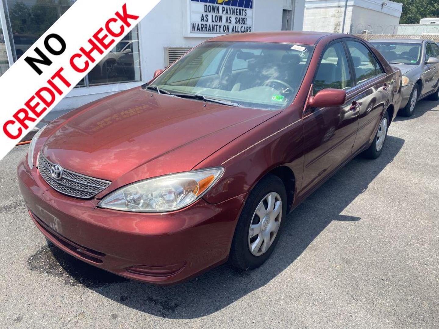 2004 RED TOYOTA CAMRY LE (4T1BE32K44U) with an 2.4L engine, Automatic transmission, located at 930 E Little Creek Road, Norfolk, VA, 23518, (757) 588-0420, 36.915051, -76.244408 - Photo#0