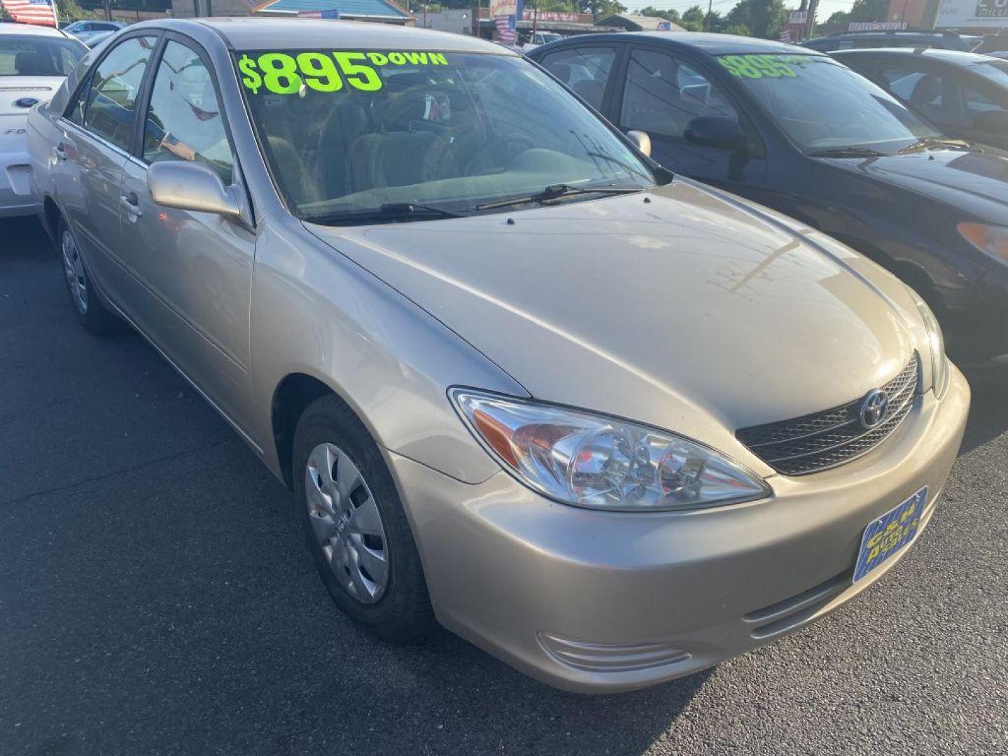 2003 GOLD TOYOTA CAMRY LE (4T1BE32K33U) with an 2.4L engine, Automatic transmission, located at 930 E Little Creek Road, Norfolk, VA, 23518, (757) 588-0420, 36.915051, -76.244408 - Photo#0