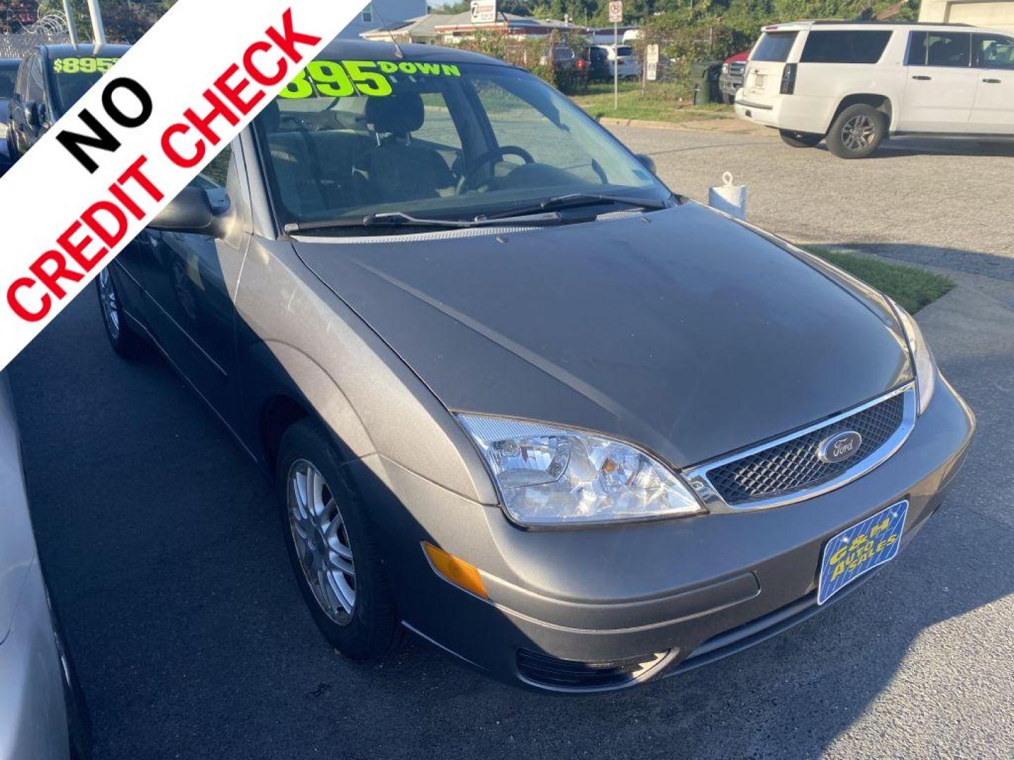 2006 GRAY FORD FOCUS ZX4 (1FAFP34N16W) with an 2.0L engine, Automatic transmission, located at 930 E Little Creek Road, Norfolk, VA, 23518, (757) 588-0420, 36.915051, -76.244408 - Photo#0