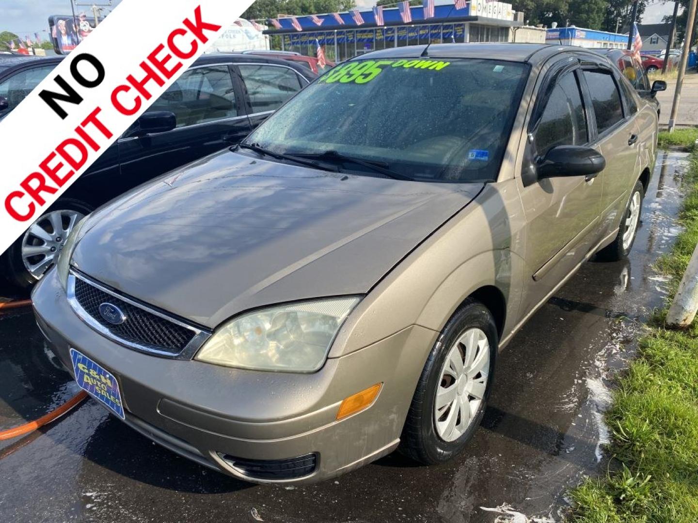 2005 TAN FORD FOCUS ZX4 (1FAFP34N35W) with an 2.0L engine, Automatic transmission, located at 930 E Little Creek Road, Norfolk, VA, 23518, (757) 588-0420, 36.915051, -76.244408- Photo#0